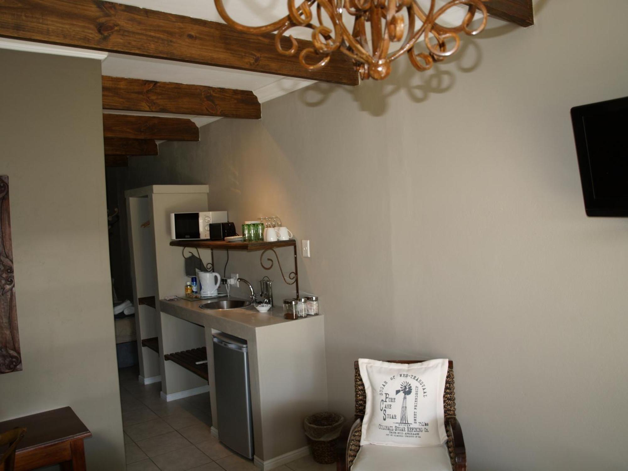Die Herehuis Beaufort West Bilik gambar